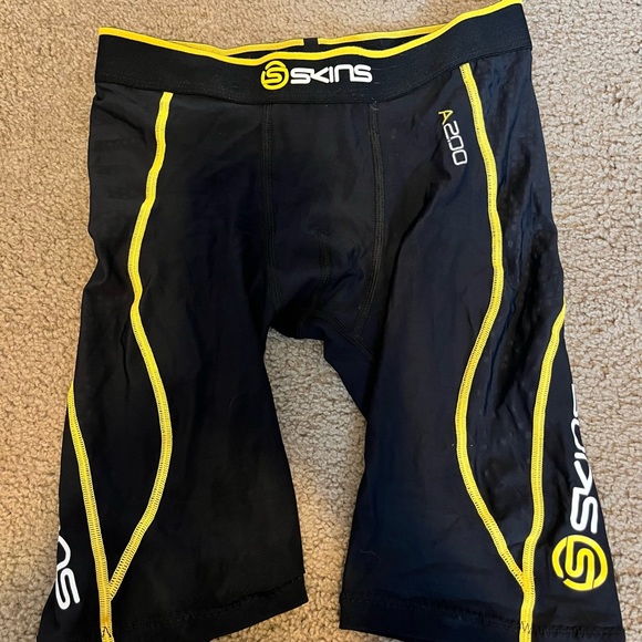 Skins Men's Black Athletic Shorts with Yellow Accents - Picture 1 of 3